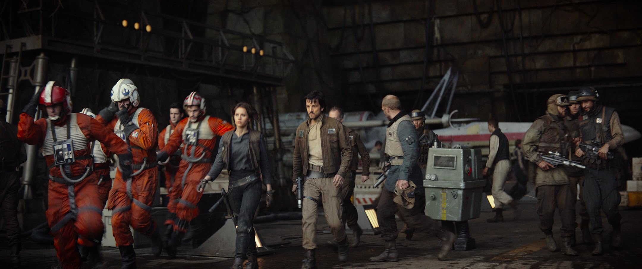 Jyn, Cassian, and the crew gather in the Rebel war room before boarding the U-wing.