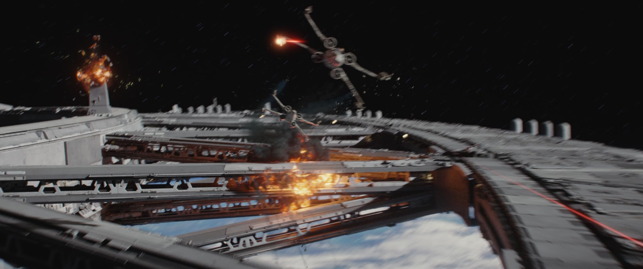 Director Krennic walks the hallway of the unfinished Death Star, the white walls echoing dread.